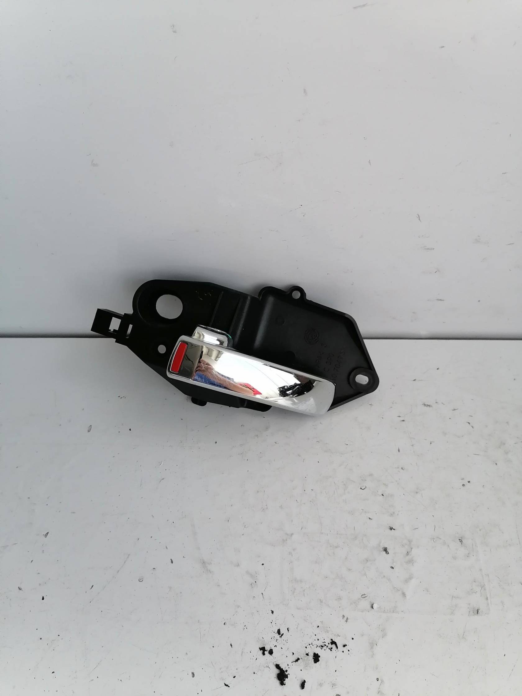 Maniglia int. apertura  porta ant. sx.